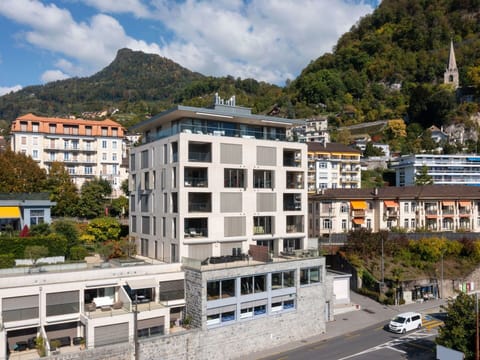 Cloud, Building, Plant, Sky, Window, Mountain, Tree, Urban Design, Neighbourhood, Condominium