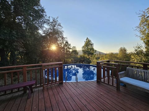 Sun setting, gate open to pool