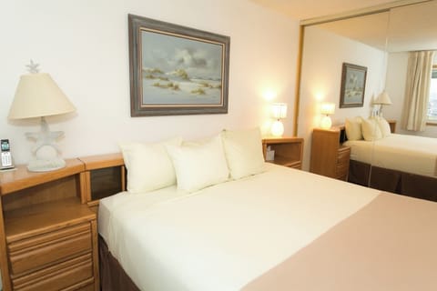 Settle in with bedside lighting and a calm, cozy vibe.
