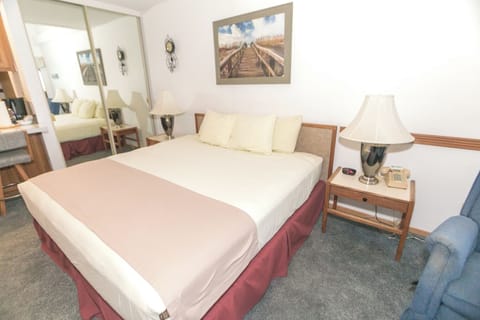 Drift into deep sleep on crisp linens and plush pillows.