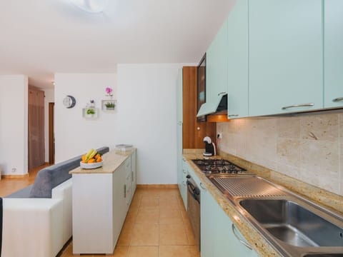 Kitchen, Countertop, Interior Design, Flooring, Wood, Floor, Kitchen Appliance, Major Appliance, Furniture, Cabinetry