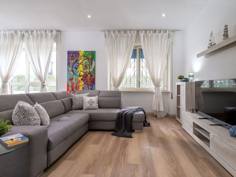 Furniture, Interior Design, Flooring, Couch, Floor, Living Room, Wood Flooring, Wood, Home, Room