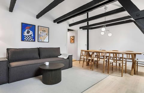 Dining and living room. Dining table equipped with 8 seats to ensure the full party can dine together. Living area also equipped with very comfortable sleeping sofa, that sleeps 2 guests. Blackout curtains on all windows.