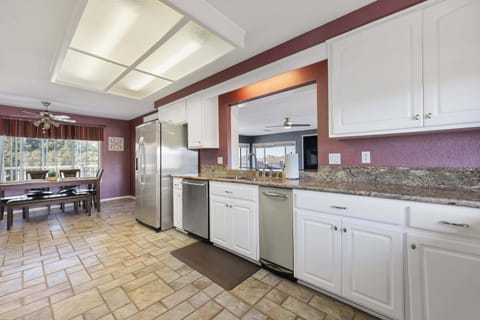Cook like a pro in this fully equipped kitchen, featuring ample counter space, modern appliances, and a stylish open layout. Whether you're brewing your morning coffee or preparing a family feast, this kitchen is designed to inspire culinary magic!