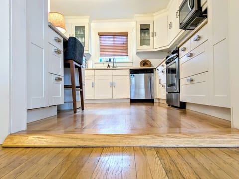 Watch Your Step! Transition from kitchen to Living room has a small step.