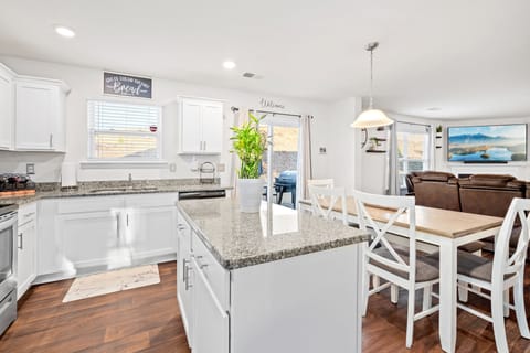 Sunlit kitchen and lounge