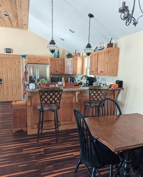 Open floor plan kitchen/dining/living area