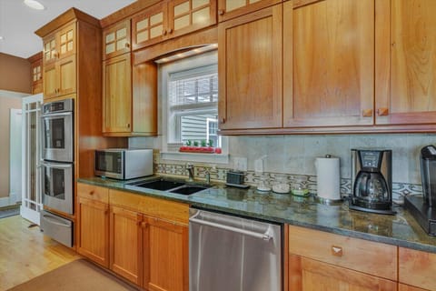 Cook up a feast in our fully-equipped kitchen with modern appliances and ample counter space.