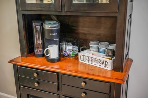 Coffee maker & supplies on both levels of the house