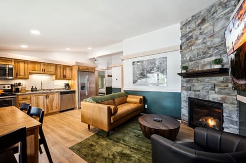 Open concept living room area with a sleeper sofa.