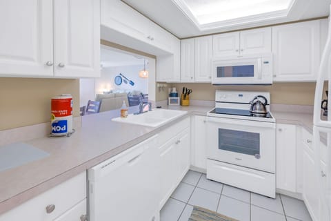 Plenty of counter space and full-sized fridge.