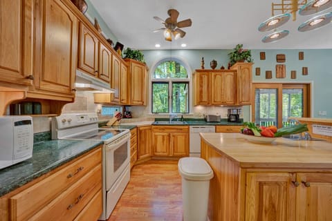 Cook up a feast in our fully-equipped kitchen with modern appliances and ample counter space.