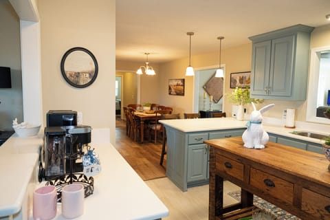 Long Island in kitchen with coffee bar area