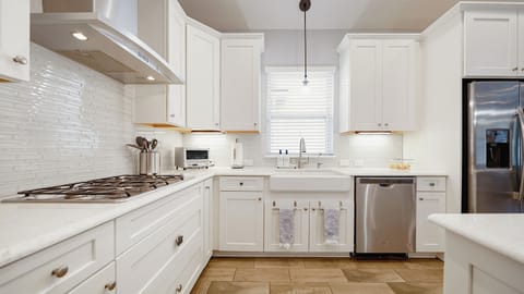 Modern chef's kitchen has all the appliances and amenities you could think of