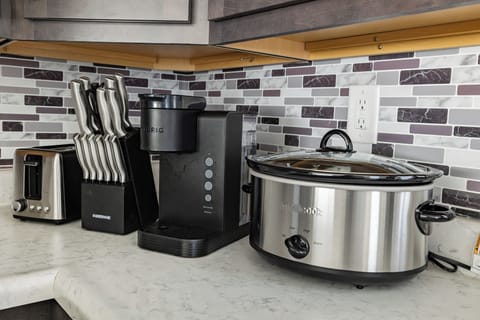 Kitchen is fully equipped with toaster, knife set, Keurig & Crock Pot