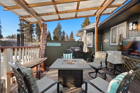 Unwind poolside by the firepit and enjoy a movie on the 42” TV.