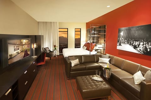 Unwind in a spacious suite with lounge seating and views.