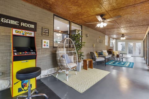 Epic deck area with ample outdoor seating and arcade games