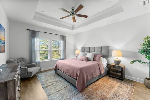 Relax in a king bed with luxury linens, a Smart TV, and cozy vibes