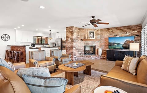 Shaddelee has an Open Floor Plan with Living Room, Dining Room and Kitchen being the Center