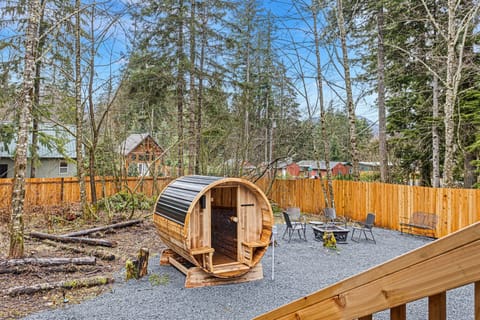 Fully fenced private backyard with sauna, hottub, fireplace