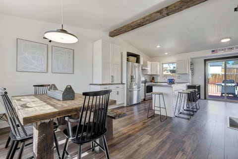 Bright and inviting open-concept kitchen and dining area, perfect for shared meals and gatherings!