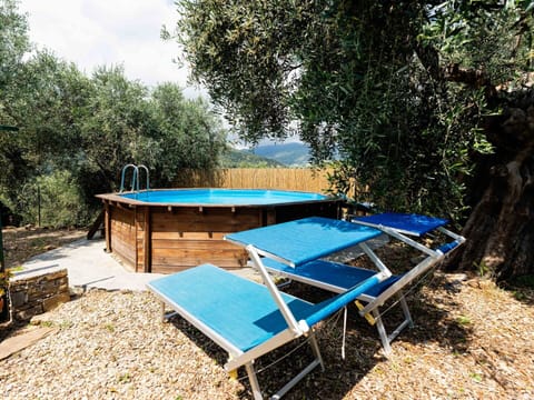 Blue, Furniture, Swimming Pool, Outdoor Furniture, Shade, Chair, Resort, Backyard, Wood Stain, Hardwood