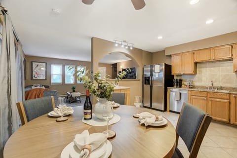 Seating for four at the table and more at the bar.