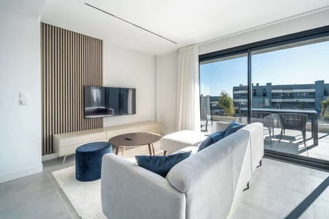 
Bright and cozy living room with comfortable seating.