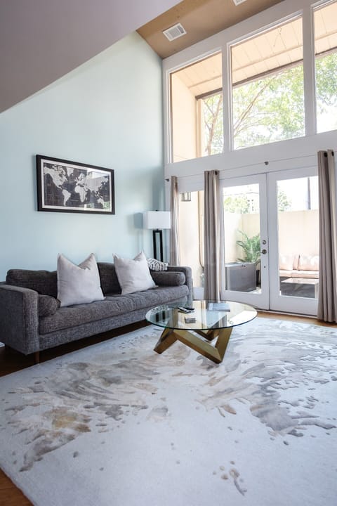 Historic charm meets modern comfort in this cozy gathering space with enclosed patio for extra outdoor living space