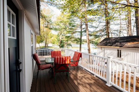 Enjoy meals or morning coffee in serene nature, just steps from the water!