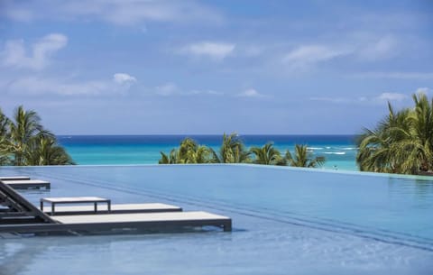 Float above turquoise waters with endless horizon views.