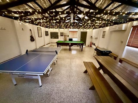 Games room of a night time with mood lights