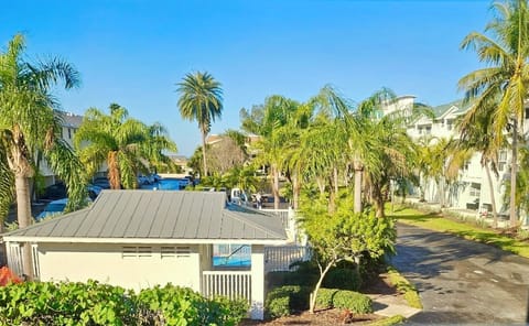 View from Living Room. Closest condo in Captain's Cove to Pool and beach, just steps away!