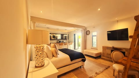 Petunia is a 1-bedroom unit with an ensuite bathroom and open open-plan kitchen.