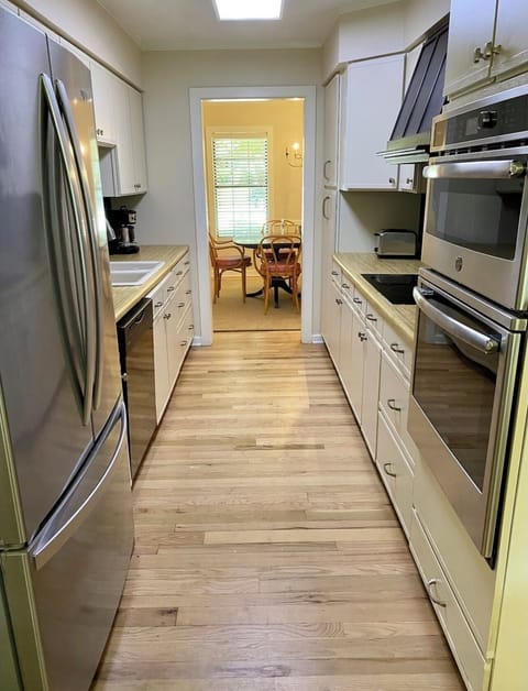 Kitchen with view leading to dining room