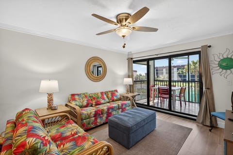 Living area with slider access to the private screened lanai