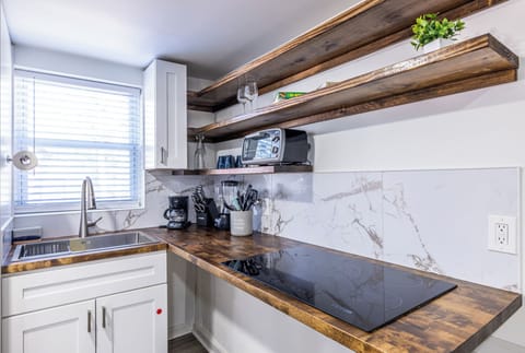 From morning oatmeal to late-night snacks, this space makes staying in easy and comfortable.