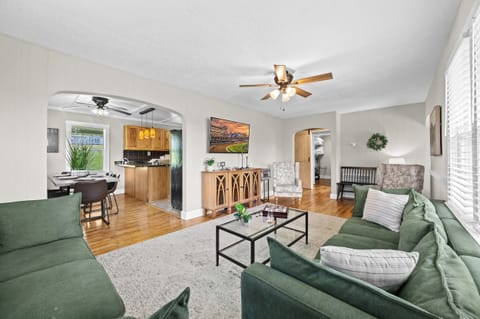 Living Room: Our spacious living area, bathed in natural light, is your perfect haven for relaxation, connection, and creating unforgettable memories.