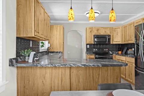 Kitchen: Ready for your morning coffee and more! Our spacious kitchen has everything you need.