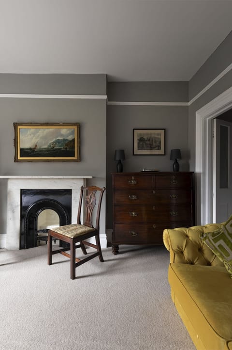 The Clarence - antiques and original paintings in bedroom two