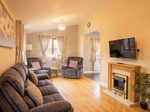 Sink into luxury. Our stylish lounge is designed for relaxing with loved ones, catching up on films, or simply enjoying the peaceful woodland surroundings.