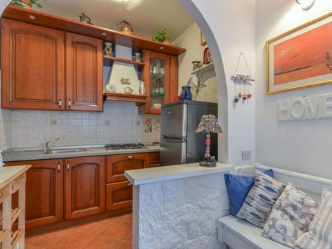 Furniture, Interior Design, Wood, Flooring, Kitchen, Major Appliance, Kitchen Appliance, Countertop, Floor, Cabinetry