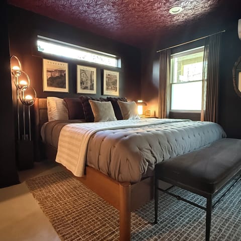 Luxury King Nectar mattress & sturdy, elegant West Elm frame for max comfort.