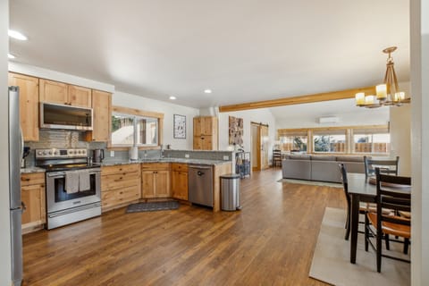 Well-stocked kitchen with views to the living room