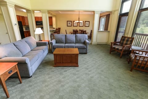 Spacious and inviting living area with plush seating, perfect for relaxing or gathering with loved ones.