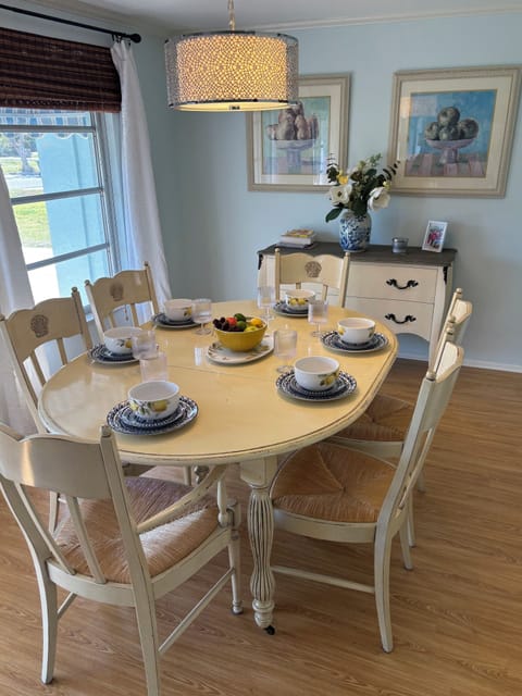 Dining room shown for six, but has two additional leaves for a larger group.