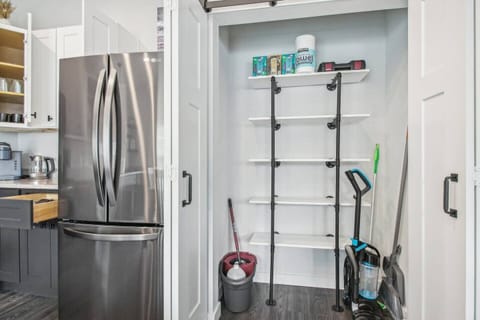 Plenty of storage for supplies in the large pantry, along with complimentary cleaning items and a toolbox.