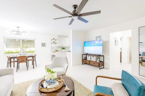 Relax in the comfortable living area with a 65" smart TV