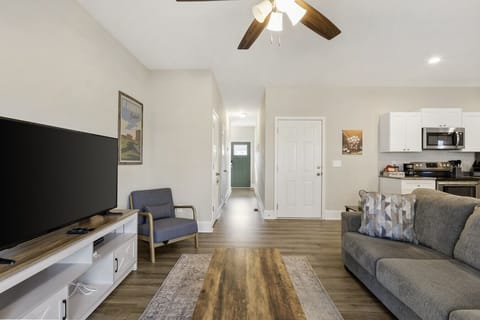 Modern and airy living area with direct access to the patio—designed for comfort and style.